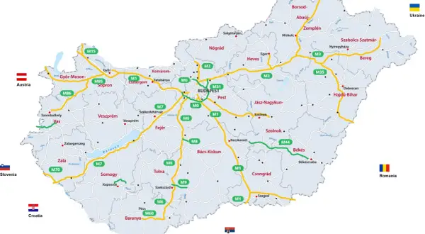 Mapa Węgier z zaznaczonymi autostradami (żółte i zielone linie) oraz nazwami miast i regionów.